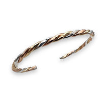 C16TRICO - The Twist Cuff Triple Metal Edition