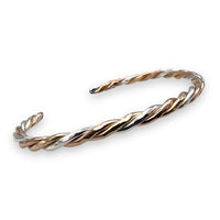 C16TRICO - The Twist Cuff Triple Metal Edition